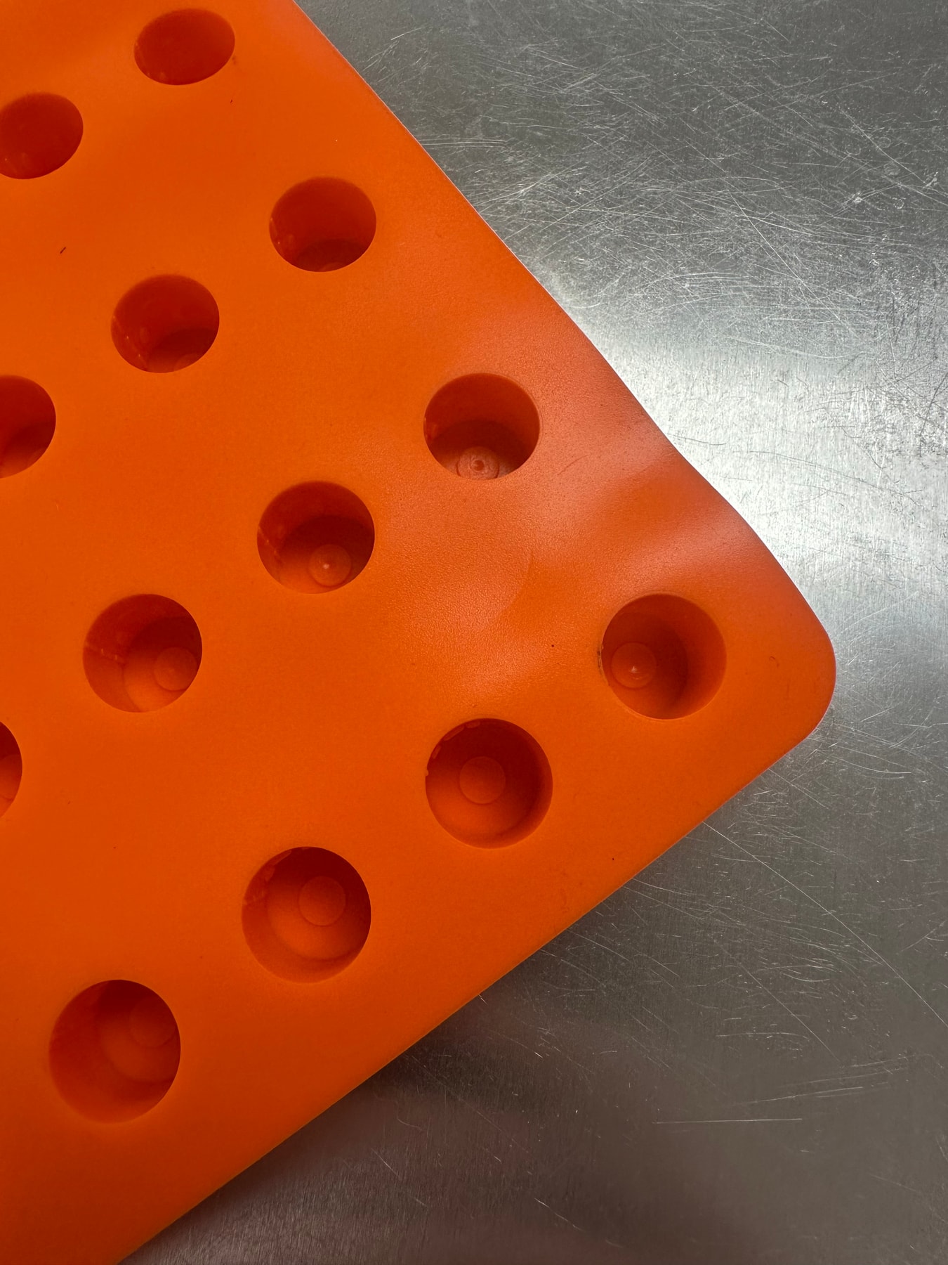 Angled close-up of toilet paper roll cavities on Product 007