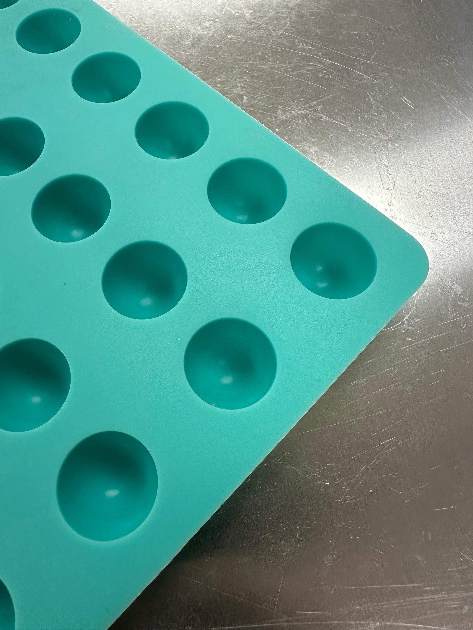 Close-up of round dome cavities on Product 004